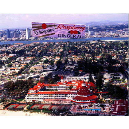 Schweppers Banner being towed over city skyline